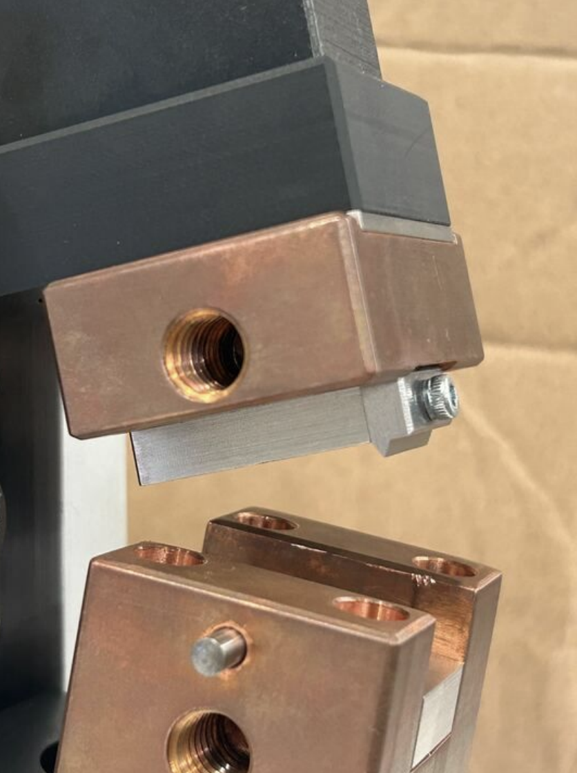 Coil bonding jig in use